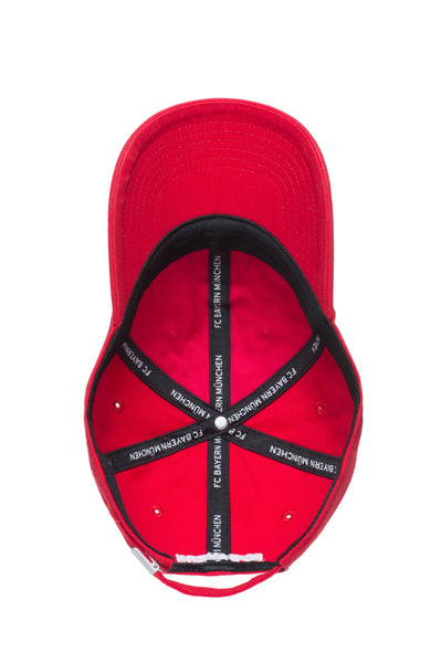 Bottom view of Bayern Munich Bambo Classic with low unstructured crown, curved peak brim, and buckle closure, in red.