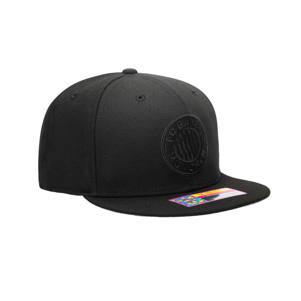 Side view of the Bayern Munich Dusk Snapback Hat with logo embroidery on the front.