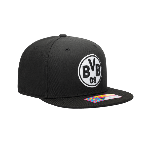 Side view of black Borussia Dortmund Hit Snapback with flat peak and embroidered logo on front.