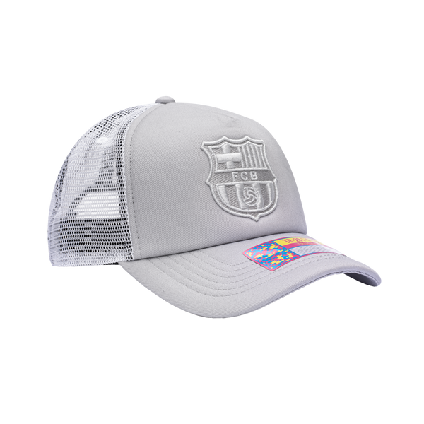 Side view of the FC Barcelona Fog Trucker Hat in Grey/White, with high crown, curved peak, mesh back and snapback closure.