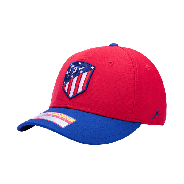 Side view of the Atletico Madrid Core Adjustable hat with mid constructured crown, cruved peak brim, and slider buckle closure, in Red/Blue.