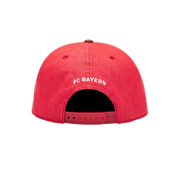 Back view of the Bayern Munich Orion Snapback with high structured crown, flat peak suede-like brim, and snapback closure, in Red/Brown.