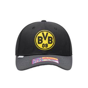 Front view of the Borussia Dortmund Trigger Adjustable hat with mid constructured crown, curved peak brim, and slider buckle closure, in Black.