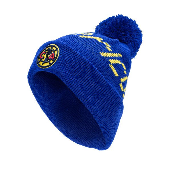 Club America Pixel Beanie with embroidered club logo on ribbed ruff, club name knitted in hat body, and pom detailing, in Blue.