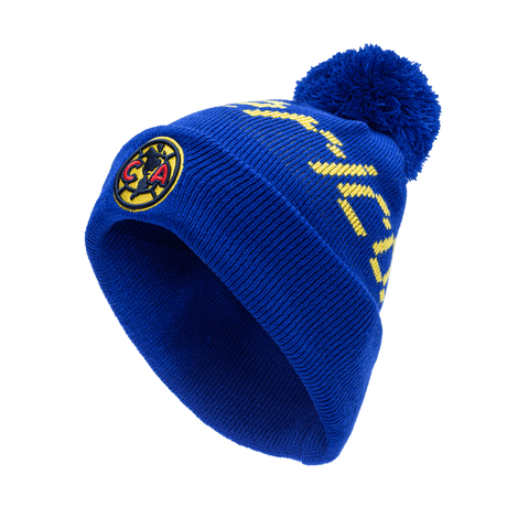 Club America Pixel Beanie with embroidered club logo on ribbed ruff, club name knitted in hat body, and pom detailing, in Blue.