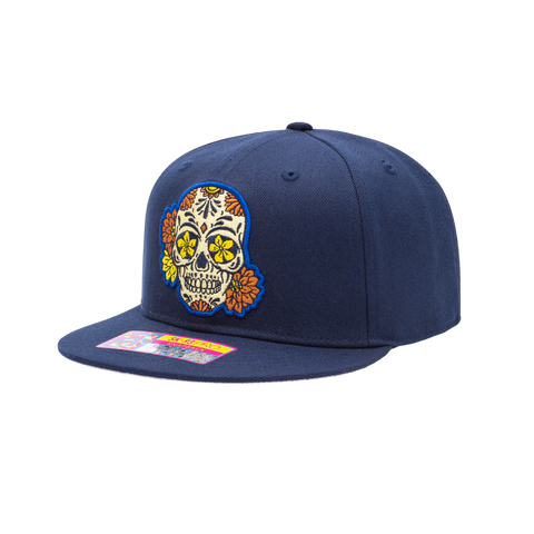 Club America Day of the Dead Snapback Hat with floral skull embroidered on the front, Club America embroidered on the side, "Dia de Muertos" embroidered on the back. The hat has a high crown, flat peak brim, and a snapback closure.