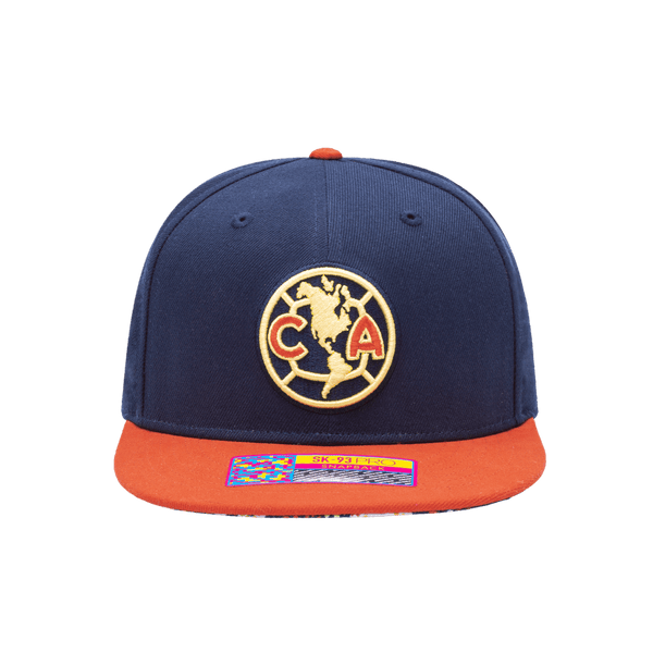 Club America Day of the Dead Snapback Hat with Club America logo embroidered on the front, floral skull embroidered on the side, "Dia de Muertos" embroidered on the back, and marigold and calavera print on the under peak. The hat has a high crown, flat peak brim, and a snapback closure.