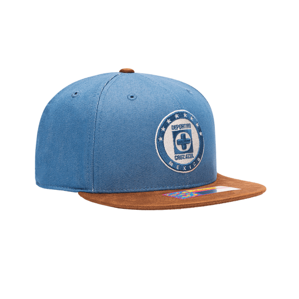 Side view of the Cruz Azul Orion Snapback with high structured crown, flat peak suede-like brim, and snapback closure, in Blue/Brown.