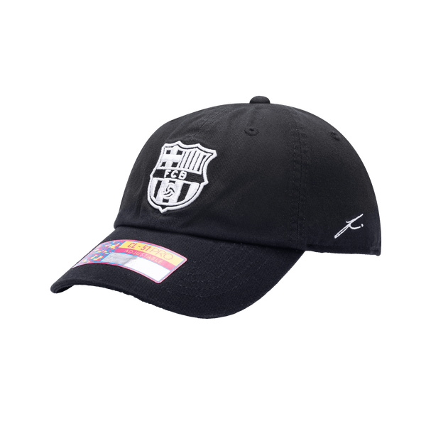 Side view of the FC Barcelona Hit Classic hat with low unstructured crown, curved peak brim, and buckle closure, in black.