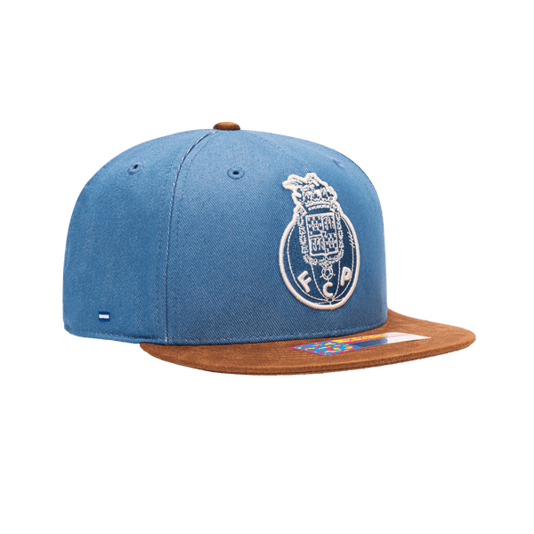 Side view of the FC Porto Orion Snapback with high structured crown, flat peak suede-like brim, and snapback closure, in Blue/Brown.