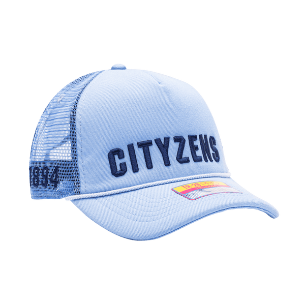 Manchester City Pride Trucker with mid crown, curved peak brim, mesh back, and snapback closure, in Light Blue