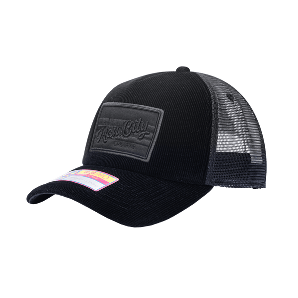 Side view of the Manchester City Signature Trucker with high crown, curved peak, and snapback closure on mesh back, in black.